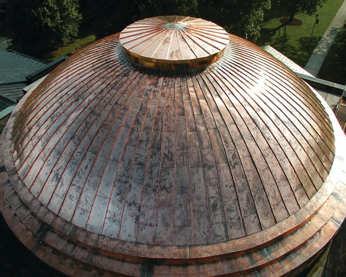 Craftsman Roofing crew installing a new roof in International Gardens